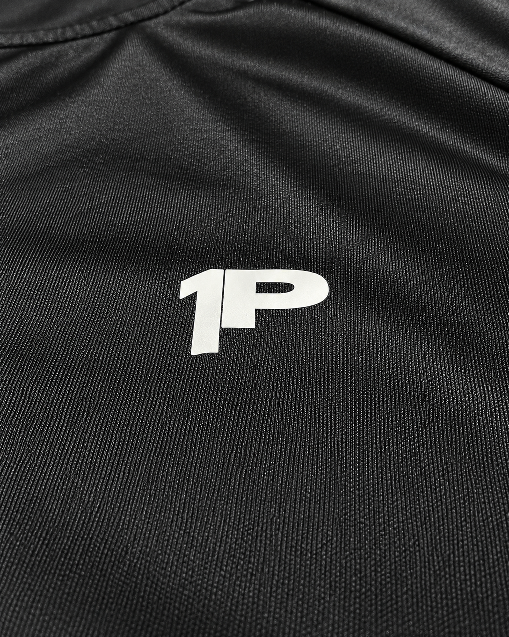 Camiseta Deportiva 1P - detalle logo
