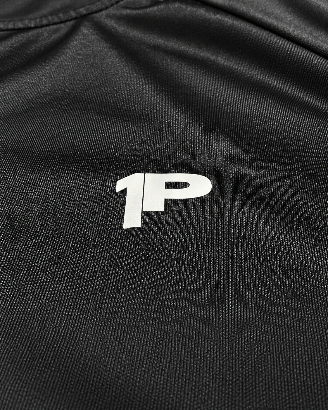 Camiseta Deportiva 1P - detalle logo